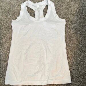 Athleta XXS White Momentum Tank with sticky band at bottom of tank, form fitted